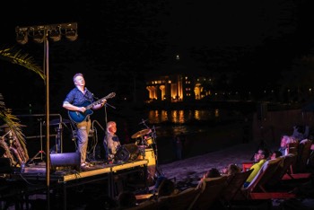  By 7:30 pm when Famed British Guitarist Peter White has taken the stage Darkness has Fallen over the Ocean.  The Lit Up Casino reflecting across the ocean waters.  